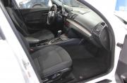белый BMW 1 серии 116i 1.6 AT (115 л.с.) 2010 фото 15