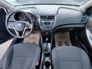серый Hyundai Solaris 1.4 AT (107 л.с.) 2016 фото 4