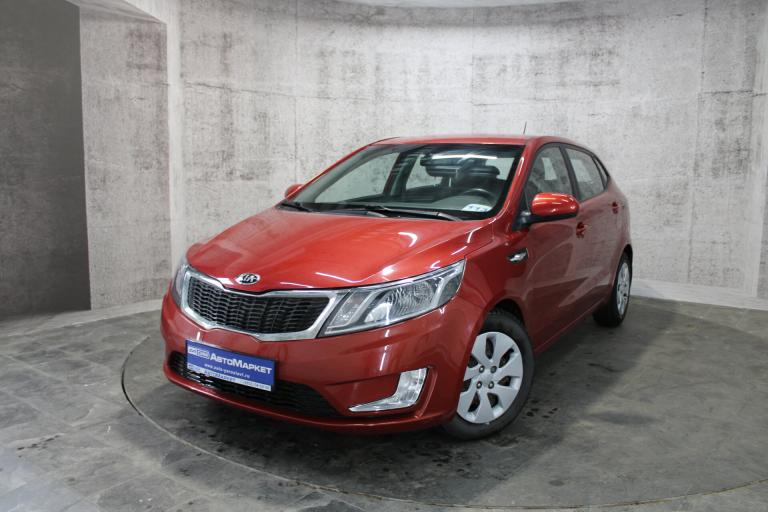 Красный Kia Rio 6-speed 1.6 MT (123 л.с.) 2014