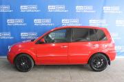 красный Ford Fusion 1.4 MT (80 л.с.) 2009 фото 3