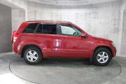 Красный Suzuki Grand Vitara 2.0 MT (140 л.с.) 4WD 2010 фото 3