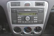 красный Ford Fusion 1.4 MT (80 л.с.) 2009 фото 19