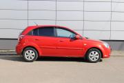 Красный Kia Rio 1.4 AT (95 л.с.) 2011 фото 3