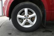 Красный Suzuki Grand Vitara 2.0 MT (140 л.с.) 4WD 2010 фото 12