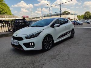 белый Kia Ceed GT, I 1.6 MT (204 л.с.) 2015