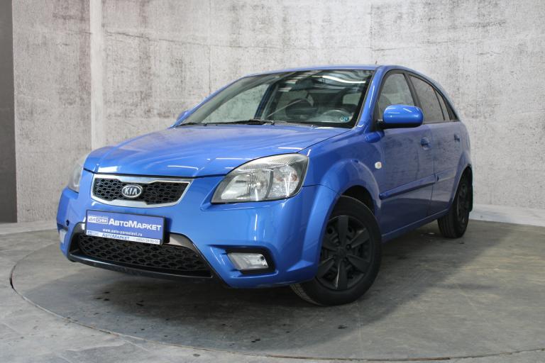 Синий Kia Rio 1.4 MT (97 л.с.) 2010