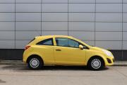 Желтый Opel Corsa 1.2 MT (85 л.с.) 2012 фото 3