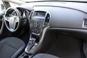 Белый Opel Astra 1.6 AT (115 л.с.) 2010 фото 10
