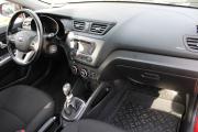 Красный Kia Rio 6-speed 1.6 MT (123 л.с.) 2014 фото 10