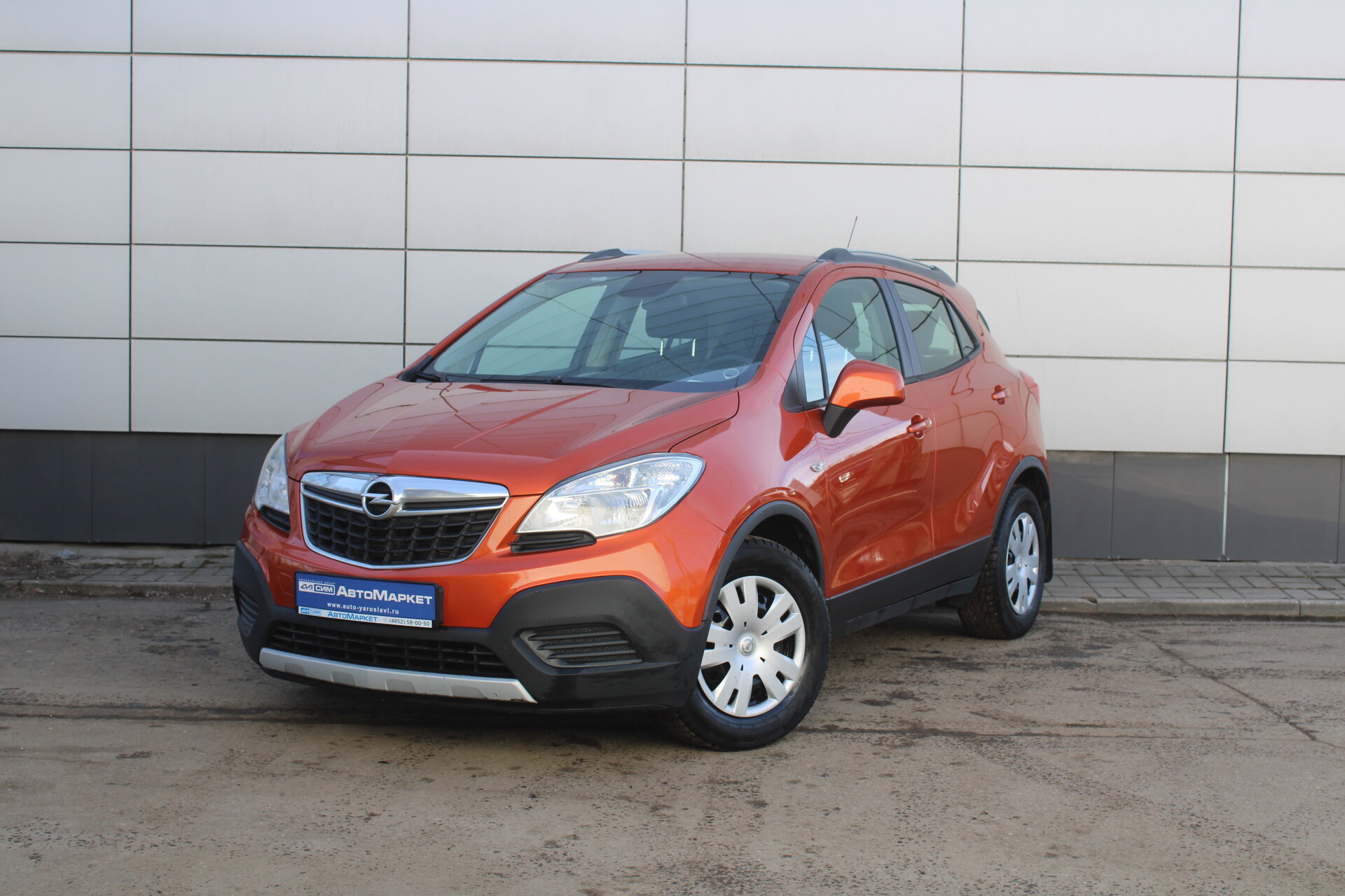 Оранжевый Opel Mokka 1.8 MT (140 л.с.) 2014