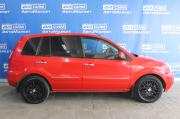 красный Ford Fusion 1.4 MT (80 л.с.) 2009 фото 2
