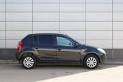 Черный Renault Sandero 1.4 MT (75 л.с.) 2011 фото 3