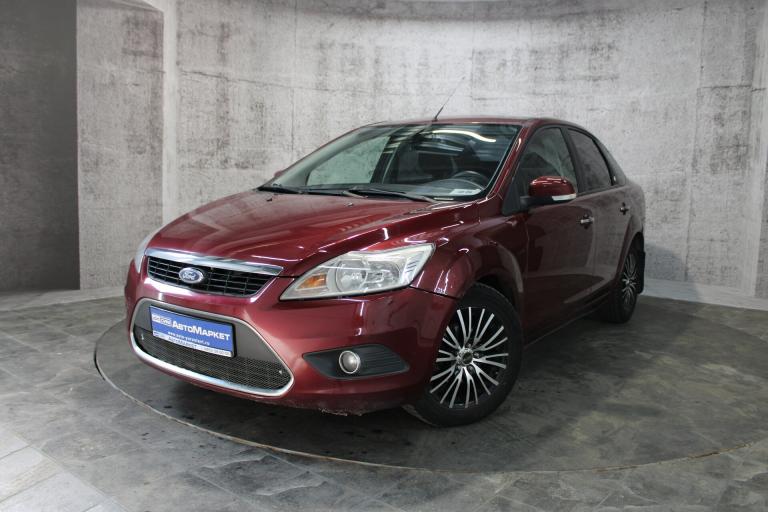 Красный Ford Focus 2.0 AT (145 л.с.) 2008