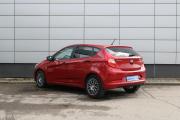 Красный Hyundai Solaris 1.4 AT (107 л.с.) 2014 фото 7