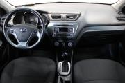 Белый Kia Rio 1.6 AT (123 л.с.) 2016 фото 8